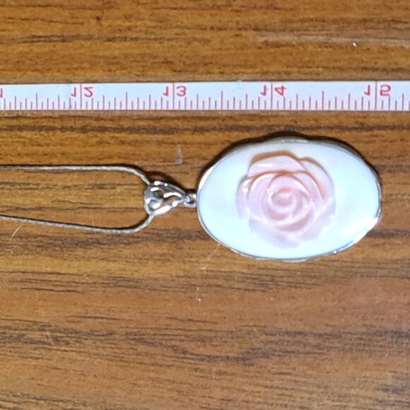 Pink Conch Shell Rhodium Over Silver Fancy Rose Pendant with Chain.
Pendant - Picture 7 of 7